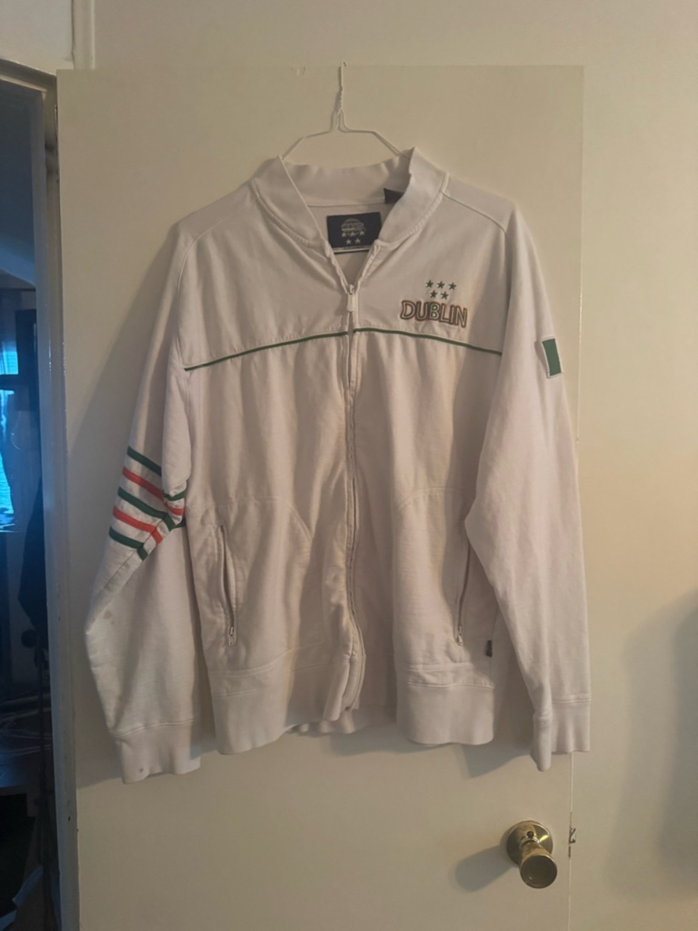 Well-loved White Dublin Zip-Up Jacket with Green & Orange Accents